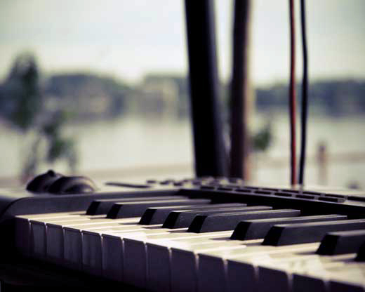 close up of piano keyboard synthesizer